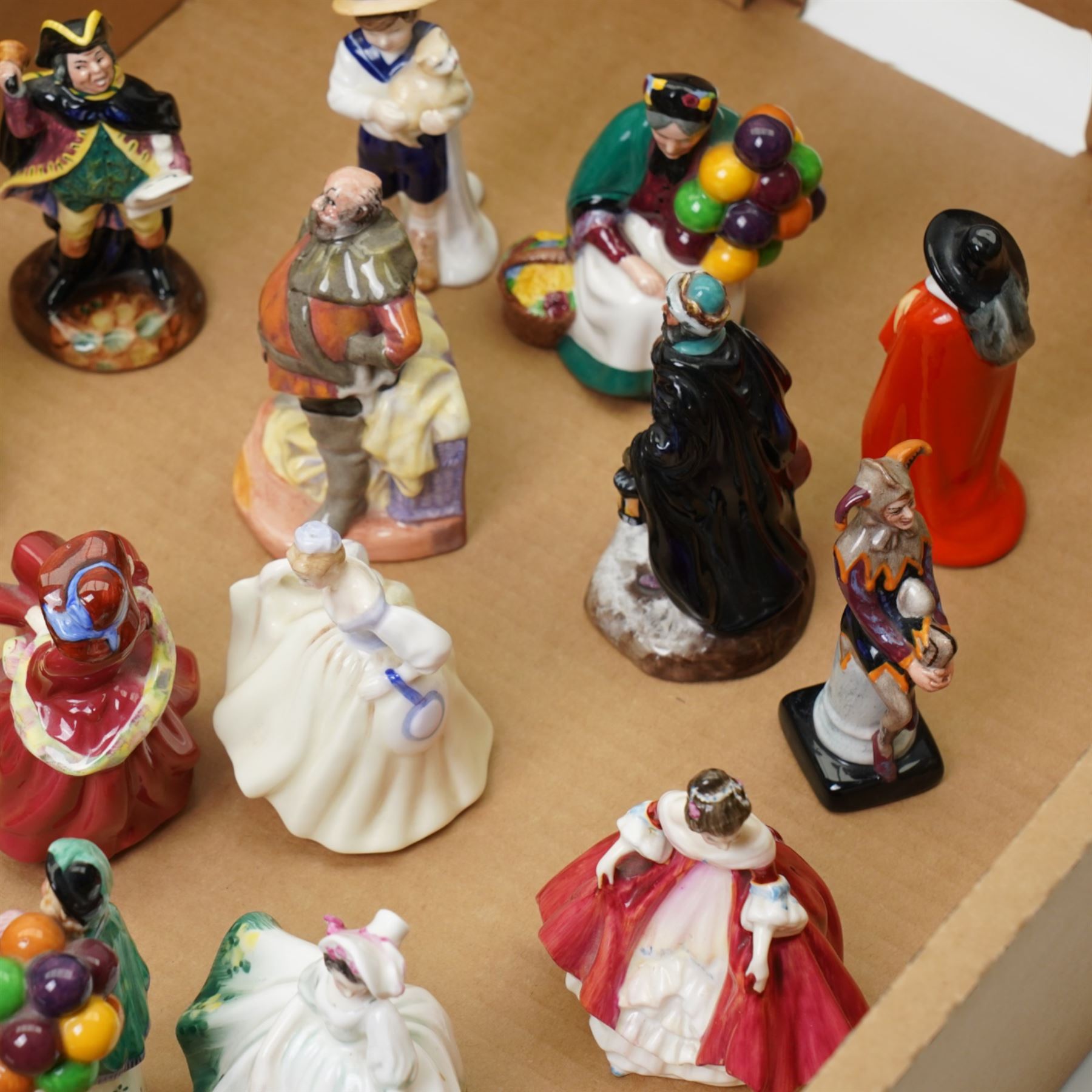 Fifteen miniature Royal Doulton figures, including Balloon Sellers, Top O The Hill, etc 