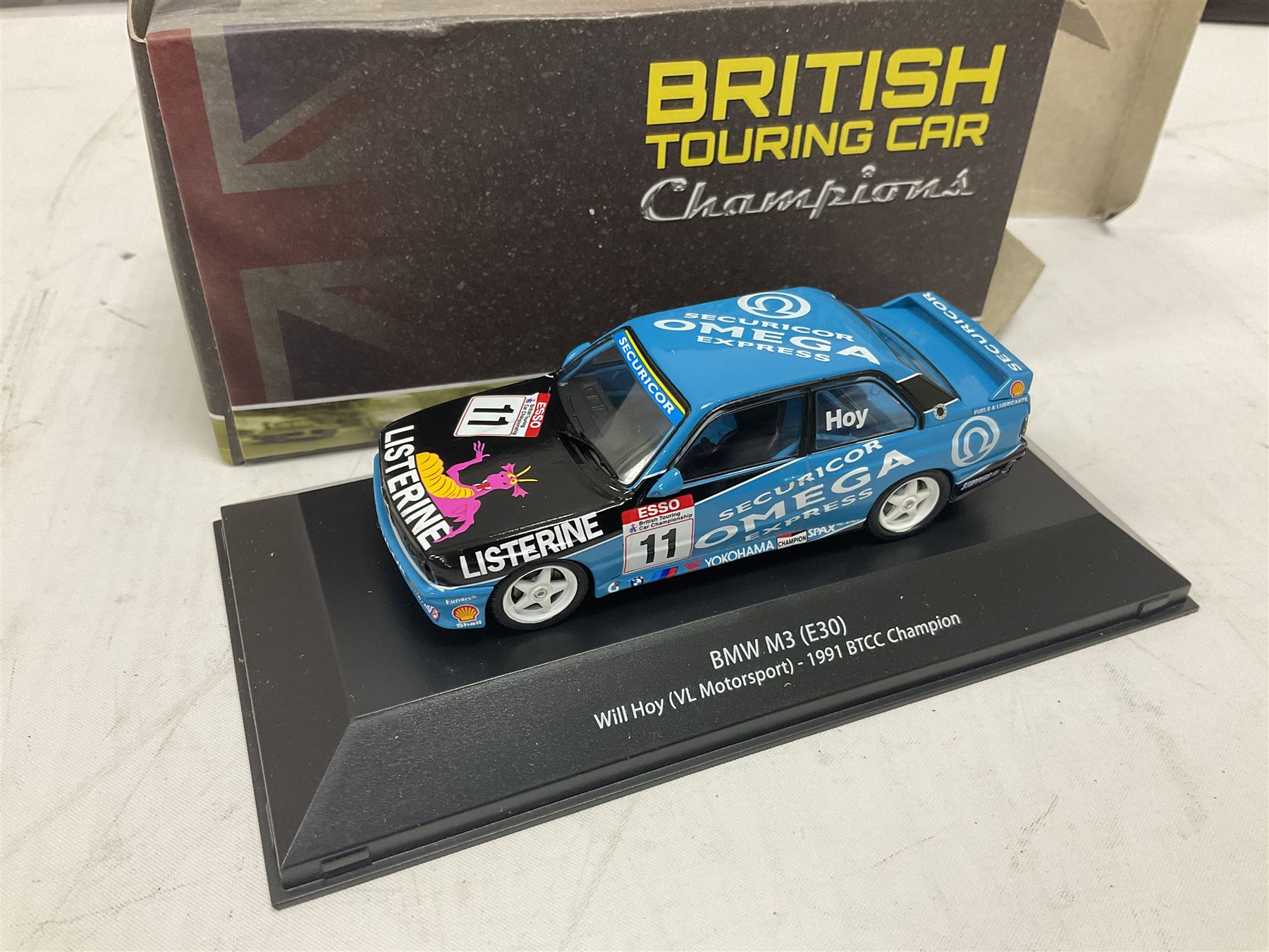 Panini Formula 1 The Car Collection - twelve blister packed racing cars and quantity of periodicals; nine mostly unopened Atlas Editions British Touring Car Champions; and six other boxed/blister packed die-cast models of racing cars