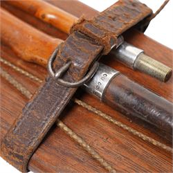 Callow & Son - 19th century travelling coaching whip, the two part yew wood shaft, with silver collars and butt end, hallmarked U & T Walker, London, with leather handle, upon a Callow & Son mount, whip L166cm 