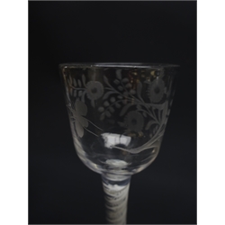  Georgian wine glass, semi-wrythen fluted ogee bowl above a opaque twist stem, H14cm and another with ogee shaped bowl engraved with trailing foliage and insect on opaque twist stem and folded slightly domed foot, H15cm (2)  