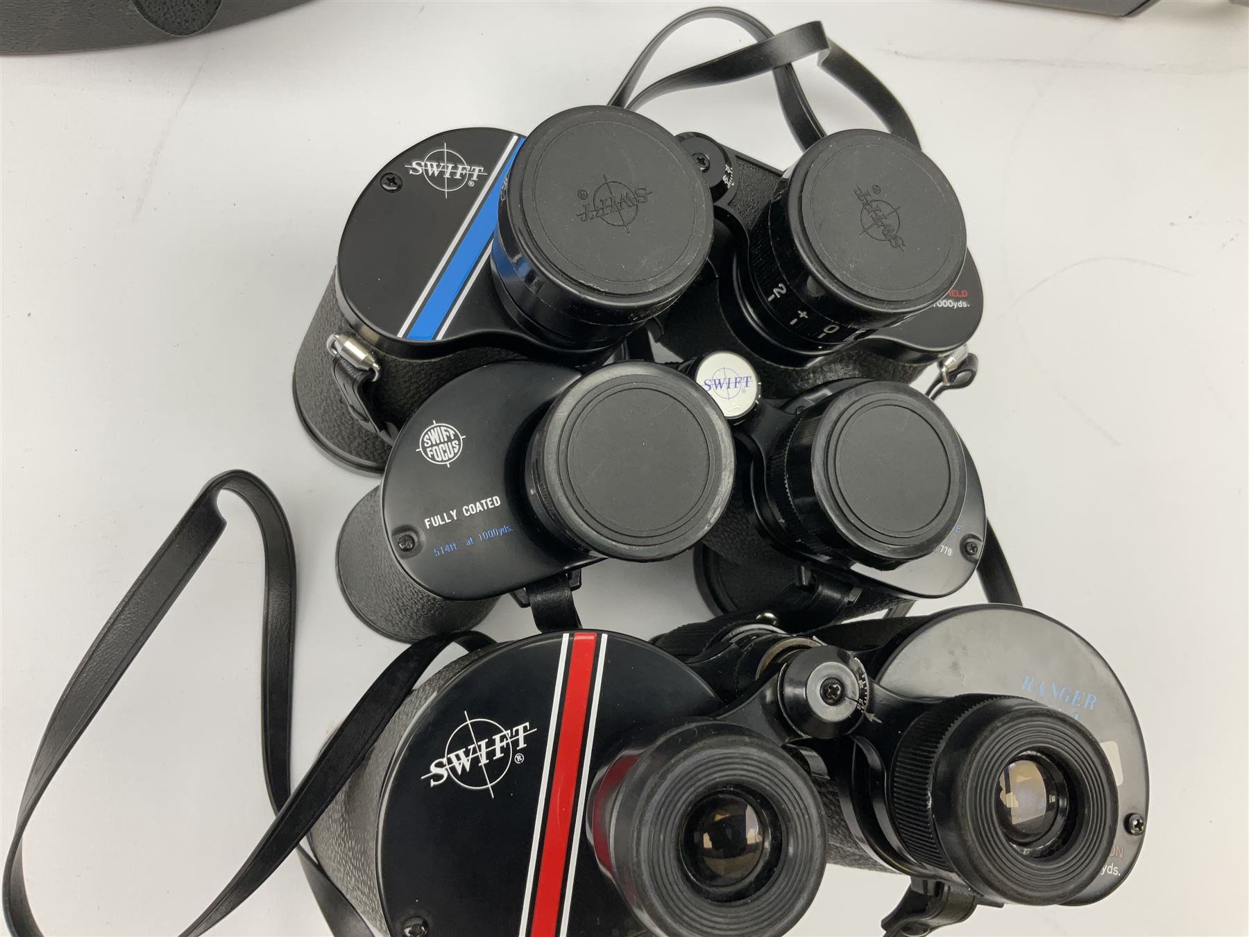Seven cased pairs of Swift binoculars, to include Ranger Mk I 10x50, Saratoga Mk II 8x40, Newport 10x50, Audubon 8.5x44 etc