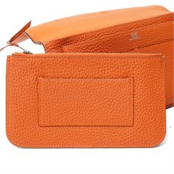 Hermès - Dogon Duo wallet, orange Togo leather, with palladium-plated Clou de Selle fastening, detachable zipped coin purse and fitted interior, stamped 10N H, with original box