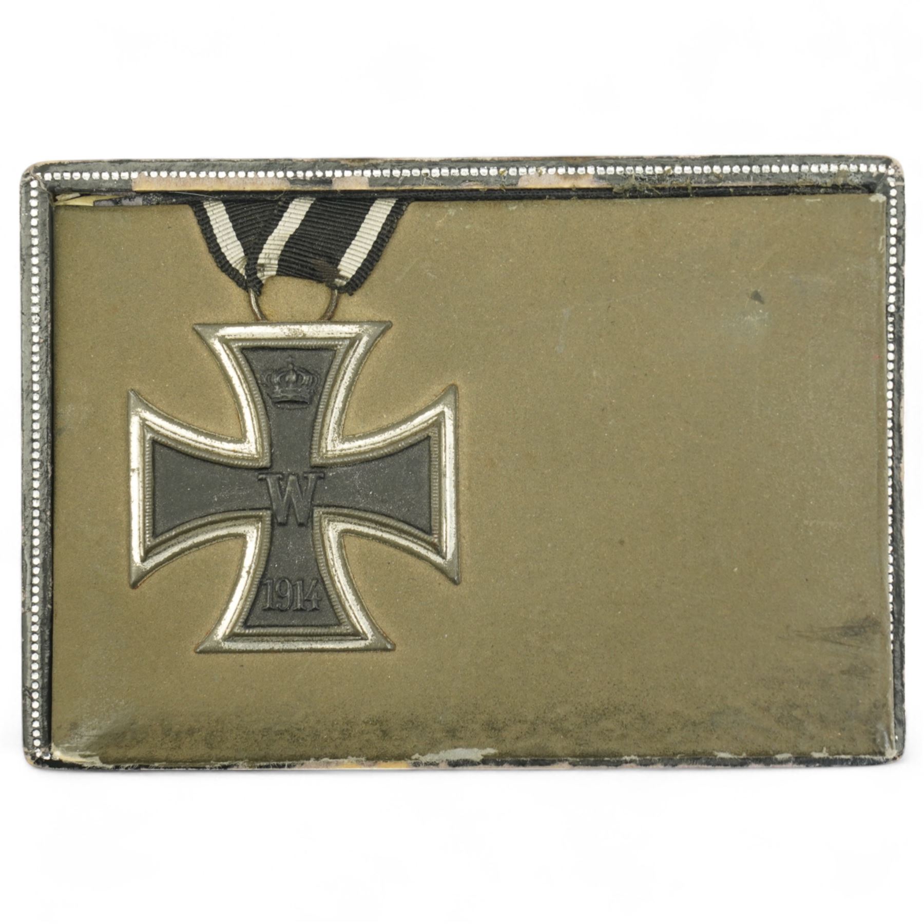German WWI Iron Cross, black grade wound badge and a quantity of brass military buttons