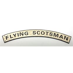 A reproduction black & white cast metal sign, detailed 'Flying Scotsman', L88cm.