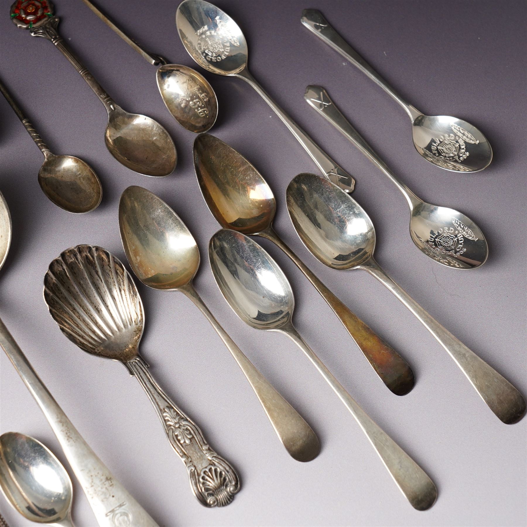 Quantity of assorted silver cutlery including sauce ladle, Victorian caddy spoon, various teaspoons, golf club spoons etc