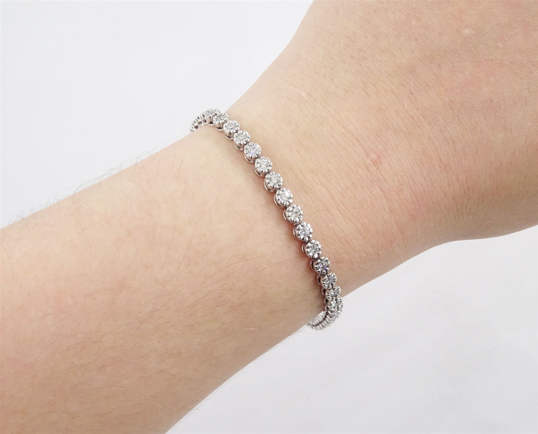 18ct white gold diamond bracelet, forty-eight round brilliant cut diamonds, in a bead setting, stamped 750, total diamond weight approx 2.50 carat