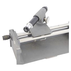 Three microscopes, including Griffin Student Vernier Microscope, Vickers Instruments binocular microscope with Leitz Wetzlar Periplan 10x lenses, and a Carl Zeiss Jena binocular microscope in a wooden Olympus Tokyo box