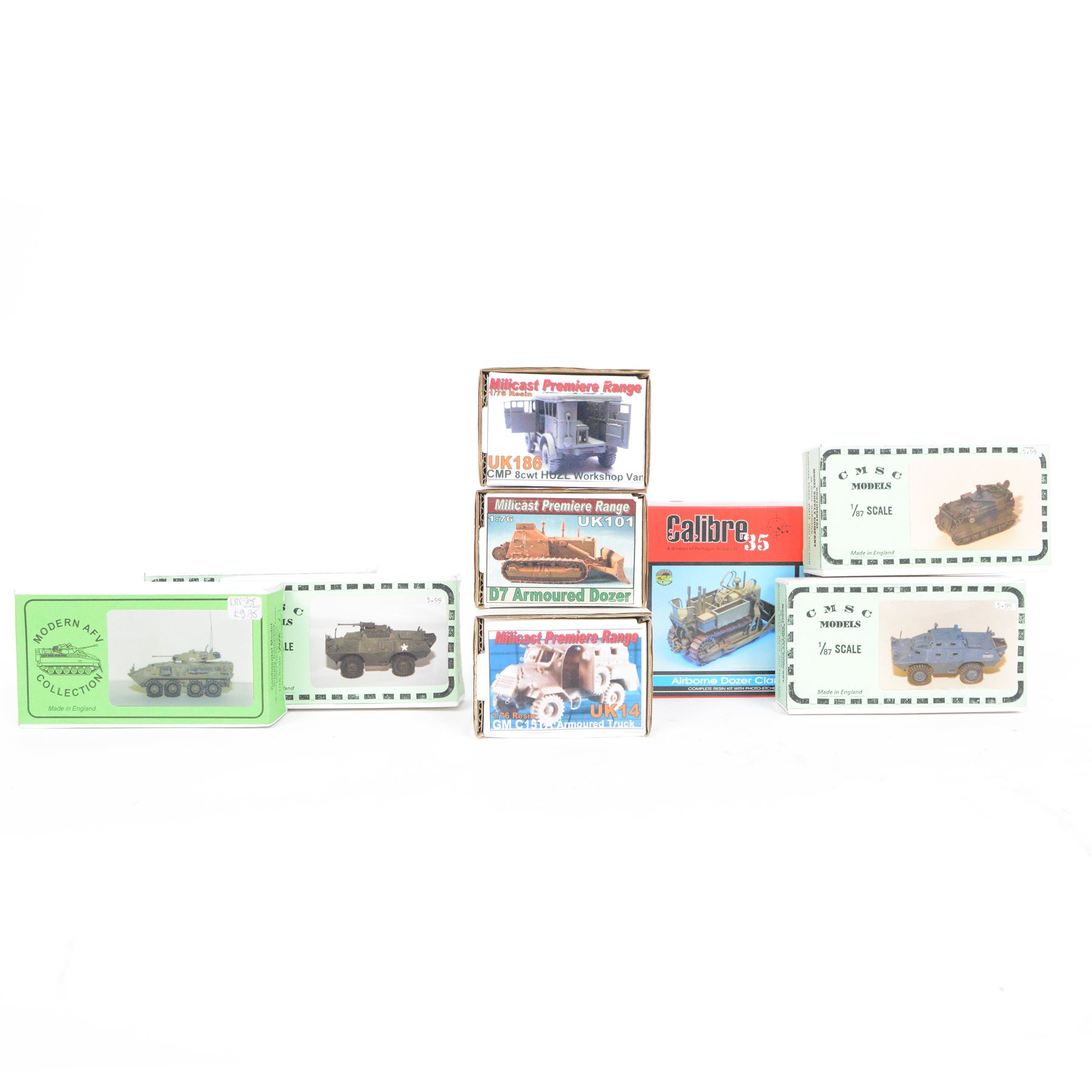 Nine military vehicle model kits, including five 1:76 and 1:87 scale Continental Model Supply Company kits, three 1:76 scale Milicast Premiere Range kits and a Calibre 35 1:35 scale Clark CA-1 Airborne Dozer kit, all boxed