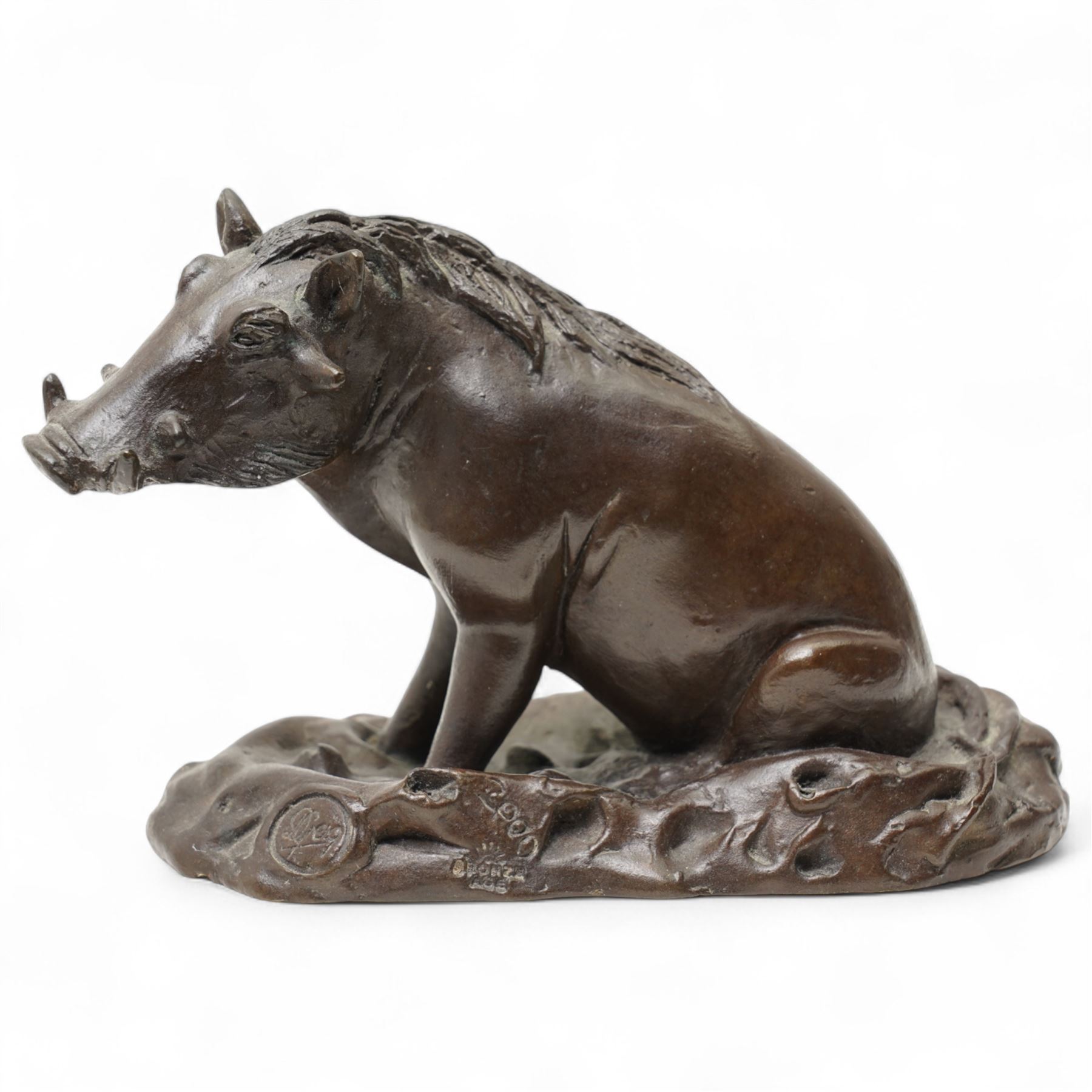 Donald Greig (South African 1959-): Seated Warthog, bronze, signed, 2007, 9cm x 13cm with certificate