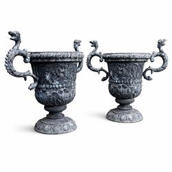 Impressive pair of early highly decorative lead garden urns, griffin handles with ornate d...