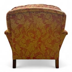 Duresta - Contemporary pair of upholstered armchairs, in red and gold damask style fabric, each with sprung seat and removable cushion back, rolled arms, on turned front supports with brass castors, square back legs 