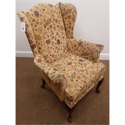  Original Parker Knoll wingback armchair, upholstered in a floral fabric, cabriole supports, W75cm  