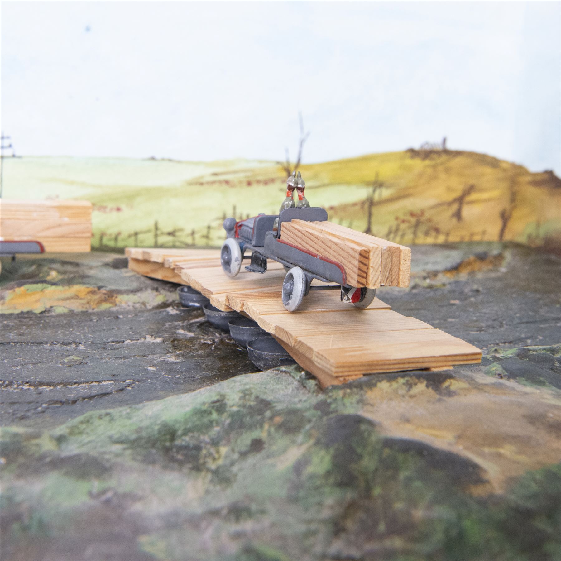 Ernst Plank; Pontoon diorama, with three wagons, pontoon boats, wooden planks and joints with all passengers and drivers, circa 1912, diorama is displayed in book Ernest Plank Miniatures; Vehicles, Transport Toys & Accessories by Jeff Carpenter pages 29 and 30  