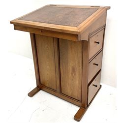 Early 20th century walnut davenport, sloped inset leather hinged lid, three side drawers, sledge supports 