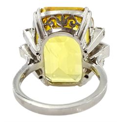 Palladium natural yellow sapphire ring, set with three baguette and round cut diamonds either side, sapphire approx 28.00 carat, with The Gem & Pearl Laboratory report stating no evidence of heat treatment, origin opinion Sri Lanka, colour transparent yellow