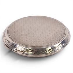 Silver compact mirror, silver handled magnifying glass and a silver-gilt bangle, all hallmarked