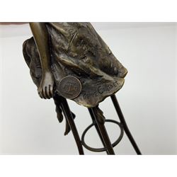 Art Deco style bronze modelled as a semi naked female figure, seated upon a chair, after 'Pierre Collinet', H27cm