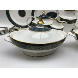 Royal Doulton Carlyle pattern tea and dinner service for six, to include teapot, coffee pot, teacups and saucers, coffee cups and saucers, milk jug, open sucrier, dinner plates, side plates, bowls, soup bowls, to covered dishes etc (64) 