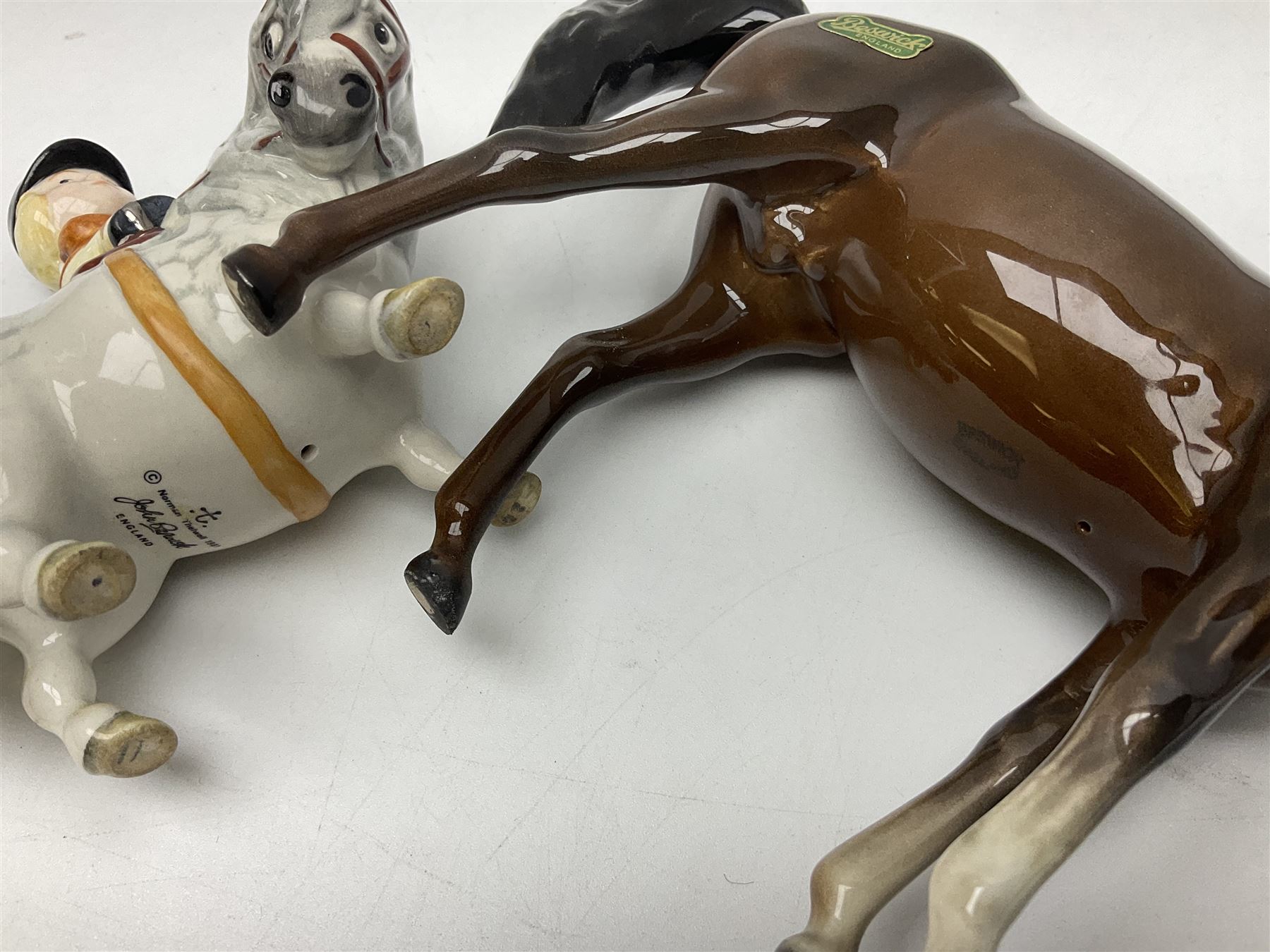 Beswick Champion of Champions Hereford bull figure no 1360, Beswick Norman Thelwell An Angel on Horseback no 2704A, and three other Beswick figures to include Arab Bay horse, Mallard and Comical Duck Family, all with printed or impressed marks beneath, largest H17.5cm