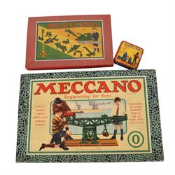 Early 20th century Meccano outfits, comprising 'Engineering in Miniature' set no. 1, 'Engi...