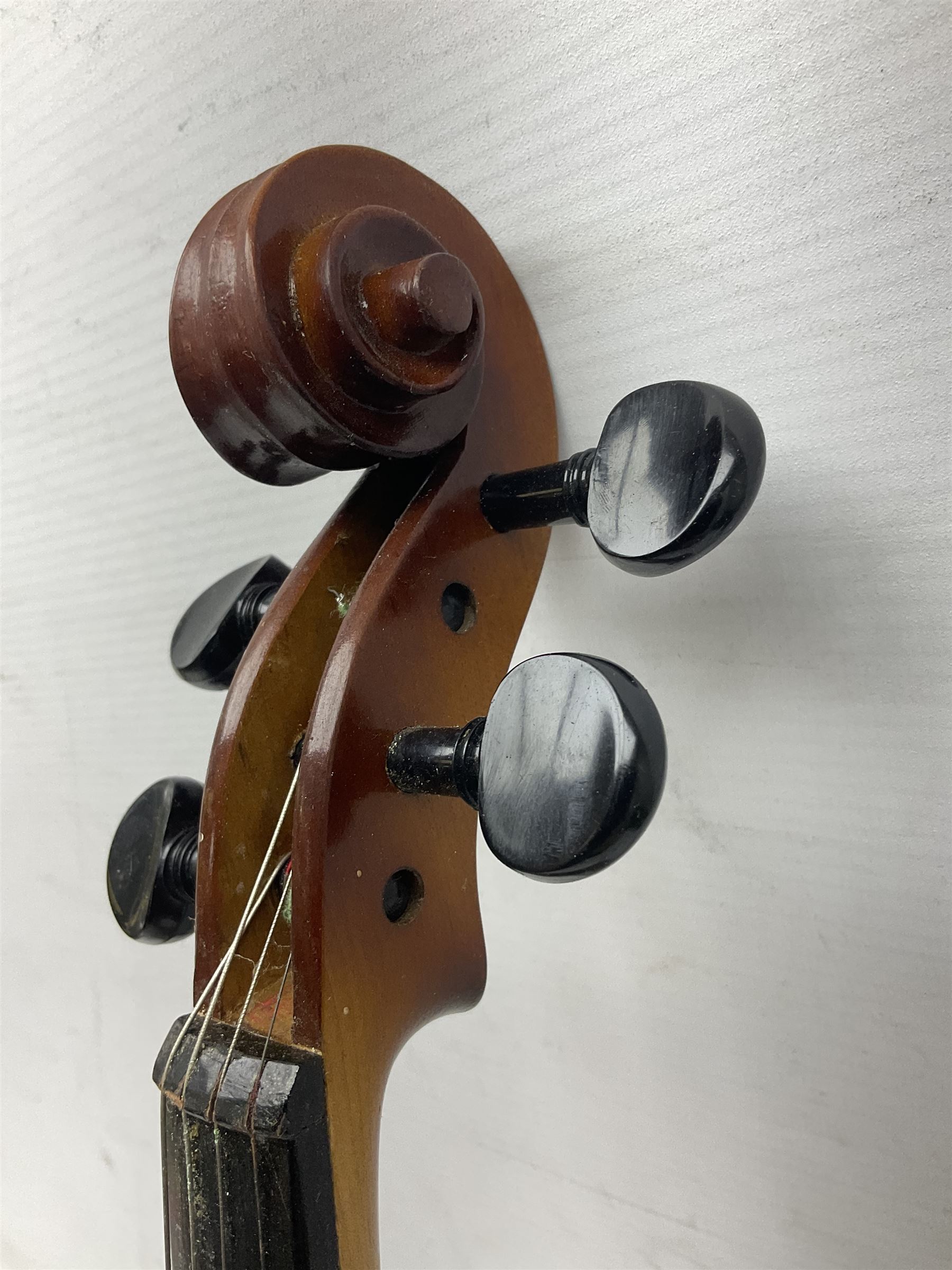 Chinese Parrot violin with 35.5cm two-piece back; L59.5cm in carrying case; and early 20th century German violin for restoration; bears label 'Antonius Stradivarius Faciebat Anno 1730'; cased with bow (2)