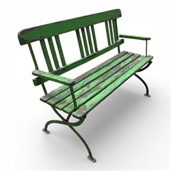 Early 19th century child's garden bench, the wrought iron frame with X frame legs and wooden slatted seat, painted in green, H63cm L90cm D35cm