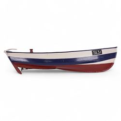 Two wooden fishing coble models, comprising SE31, with rudder, painted in blue, white and red and SSS.33 'Alice', painted in green, black and yellow, largest H16cm, L70cm