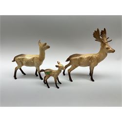 A Beswick family group, comprising stag, doe, and fawn, largest H20.5cm