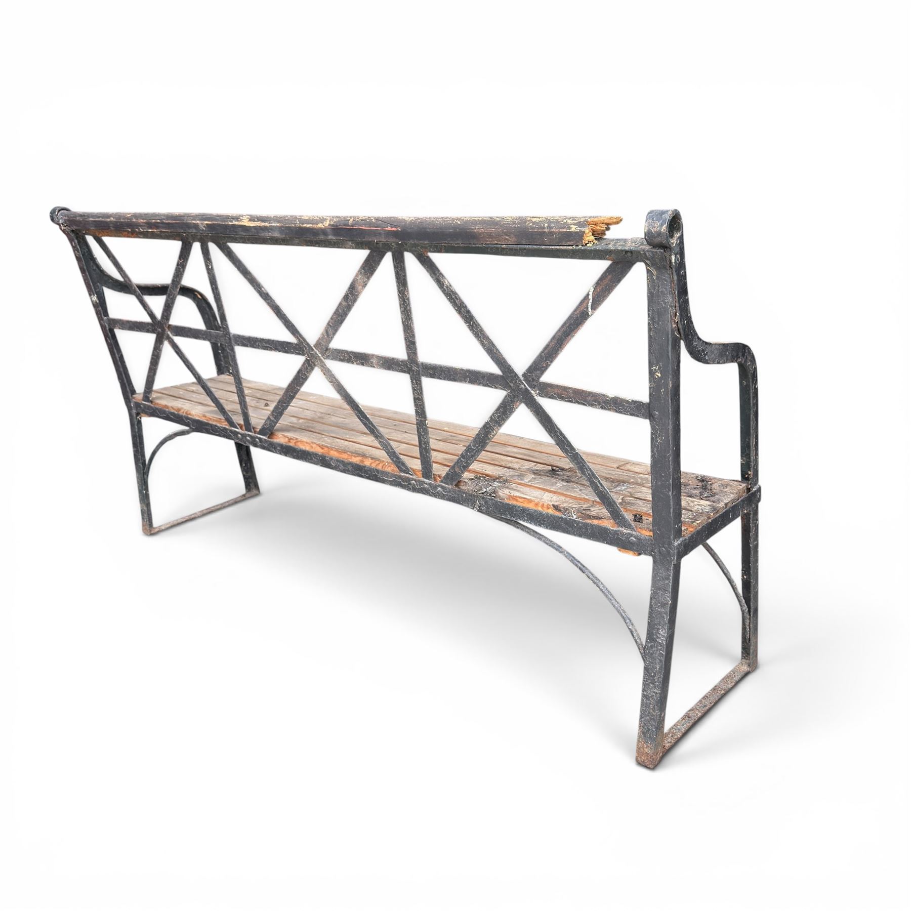 19th century and later Estate made wrought iron strapwork garden bench, the weathered wooden cresting rail over X-form strapwork back and slatted wooden seat