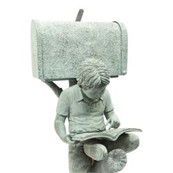 After Eneri Prosperi, bronze garden letterbox, modelled as a seated boy reading on a tree stump, with rustic post box with mail indicator, dog at his feet, textured verdigris finish throughout