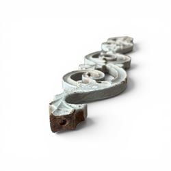 Set of eleven 19th century cast iron ornate stair or banister spindle supports, of scrolling form with scalloped decoration and flower-head motifs, in weathered duck-egg blue painted finish (11)