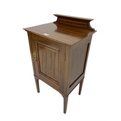 Small Edwardian inlaid mahogany bedside cabinet, enclosed by single panelled door, on square tapering supports