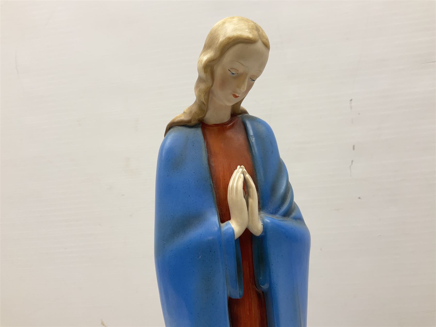 Hummel figure of a praying Saint together with a figure of a seated girl with deer, largest H40cm (2)