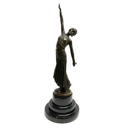 Art Deco style bronze figure of a dancer with arms outstretched, after 'Chiparus', with foundry mark, H40cm overall