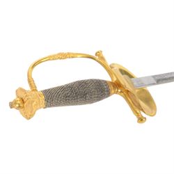 British Victorian court sword, for members of the Royal Household, by W.K & C of Solingen and retailed by Besch of Hanover St London, the 80cm blade etched to both side, the single bar hilt of gilt brass with Queens' crown pommel and downturned shell guard with the monogram of Queen Victoria, the wooden grip covered with silver wire, within leather scabbard with three gilt brass mounts and twin suspension rings, overall L96cm   