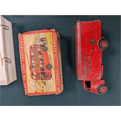 Small collection of model vehicles, including tin-plate trolley bus, Dinky Guy lorry, Triang Pedigree Prams bus, etc