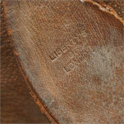 Dimitri Omersa (1927-1975) for Liberty's of London, two mid-20th century brown leather footstools, in the form of a pig and piglet, larger pig bearing Liberty stamp beneath ear, pig W86cm, piglet W49cm
