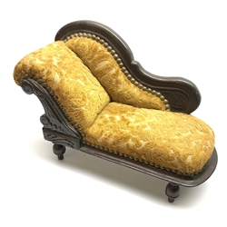 Late 19th/early 20th century doll's chaise longue with mahogany stained carved frame, scrolling back and cut dralon upholstery on four turned legs L41cm