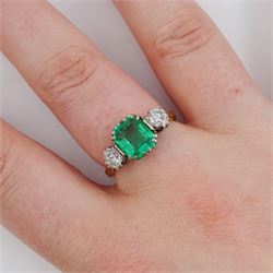 Early 20th century gold three stone transitional cut diamond and octagonal cut emerald ring, stamped 18ct, emerald approx 1.65 carat, total diamond weight approx 0.50 carat