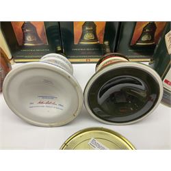 Dimple 15 Year Old Blended Scotch Whisky, together with nine Bells, scotch whisky, in Wade ceramic decanters, including Christmas 1991, 1998, 1996 etc, of various contents and proof 
