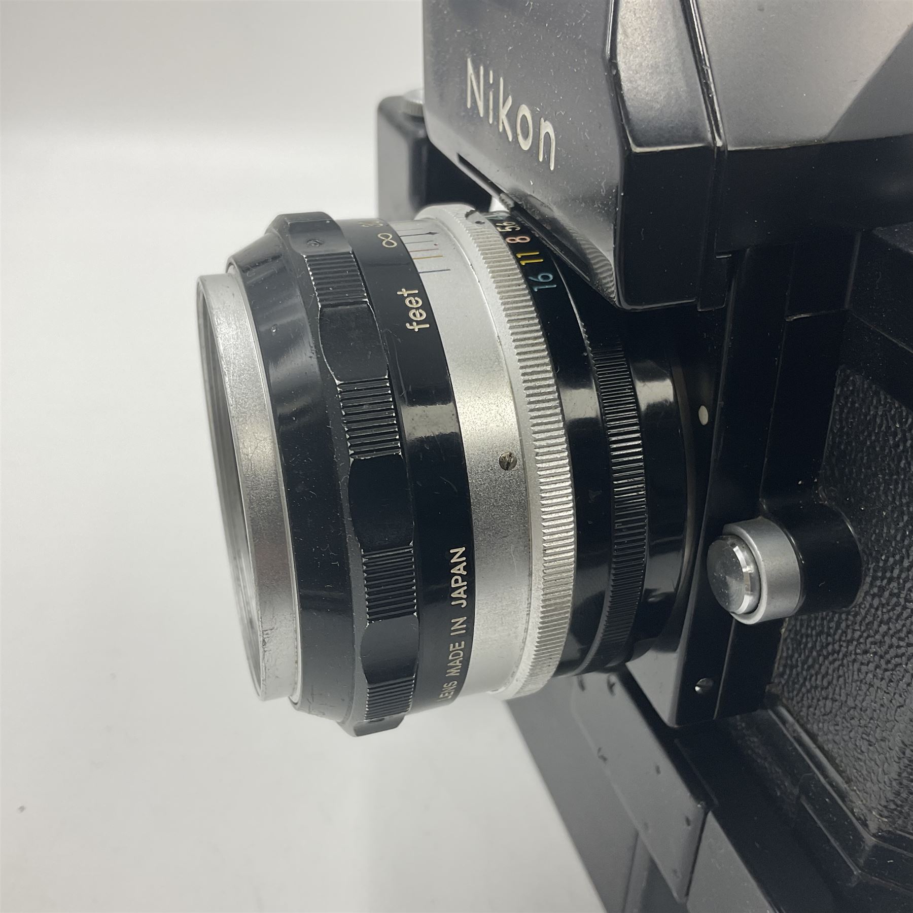 Nikon Photomic TN NKJ camera body, serial no 6728309, circa 1965, with 'Nippon Kogaku NIKKOR-S Auto 1:1.4 f=5.8cm' lens, serial no. 173909, Nikon F36 Motor Drive, serial no.132430 and Nikon cordless battery pack
