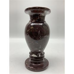 Red marble vase, of baluster form upon a stepped foot, H20cm 