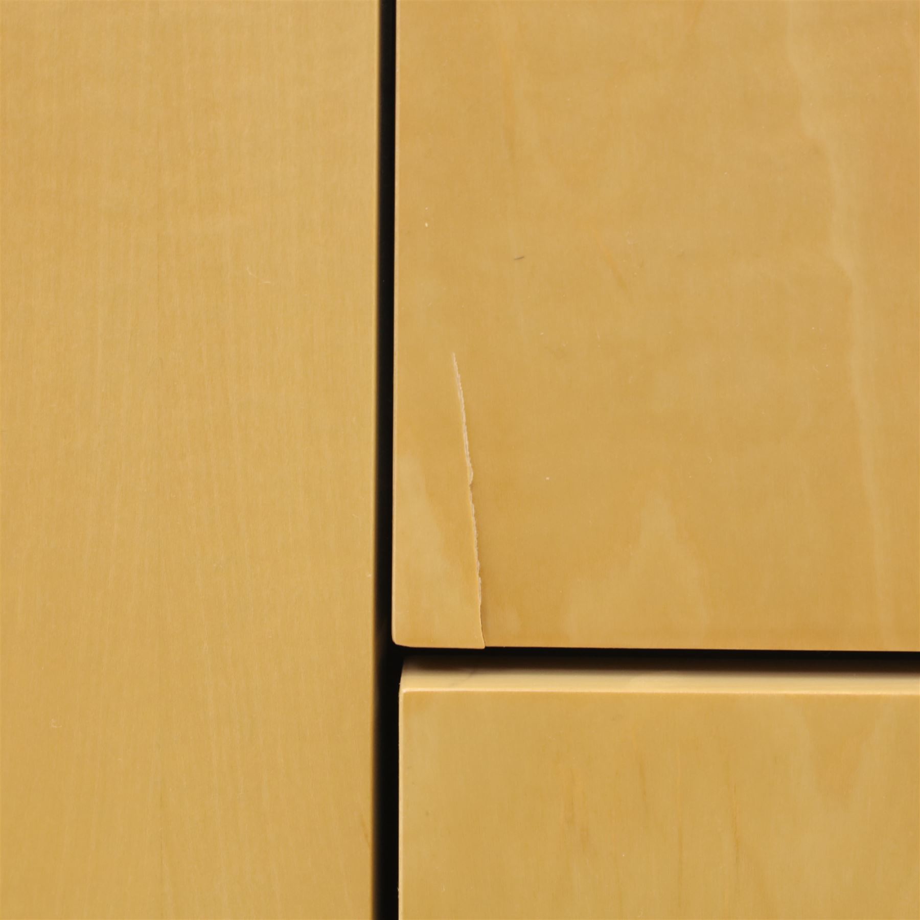 Contemporary maple veneered sideboard, serpentine glass top over six graduating Blum soft-close drawers, raised on curved black and gilt accented supports