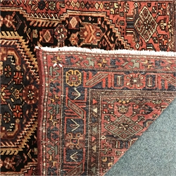 Hamadan red ground rug, central medallion, repeating border, 252cm x 143cm