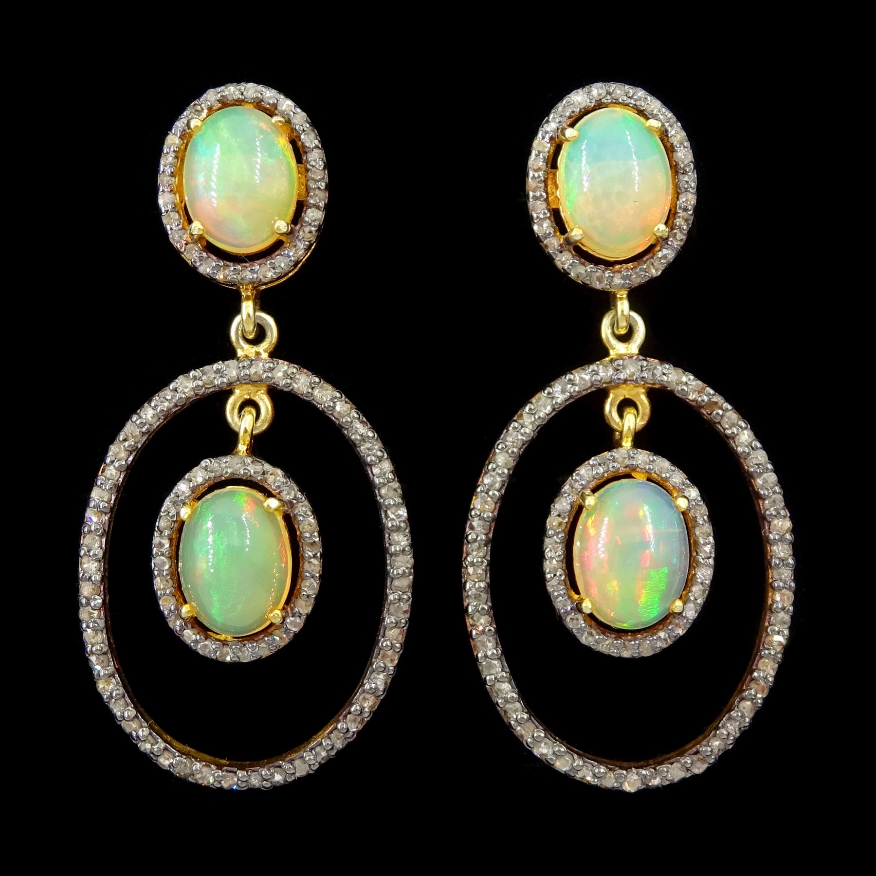 Pair of silver and gold, opal and diamond pendant stud earrings, opal and diamond cluster, suspending a further opal with diamond set surround