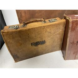 Three vintage leather suitcases, two with stamped lettering to covers, largest H39cm