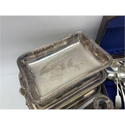 Collection of silver plated items, including cased part canteen of cutlery, loose cutlery, tureens and a pair of candlesticks