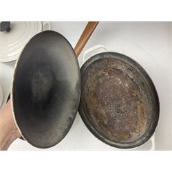 Le Creuset cast iron casserole dish, together with two Waterford cast iron dishes and a frying pan