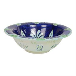 After Torquato Castellani, tin-glazed earthenware bowl, with a floral design the the centre, marked beneath, D19cm 