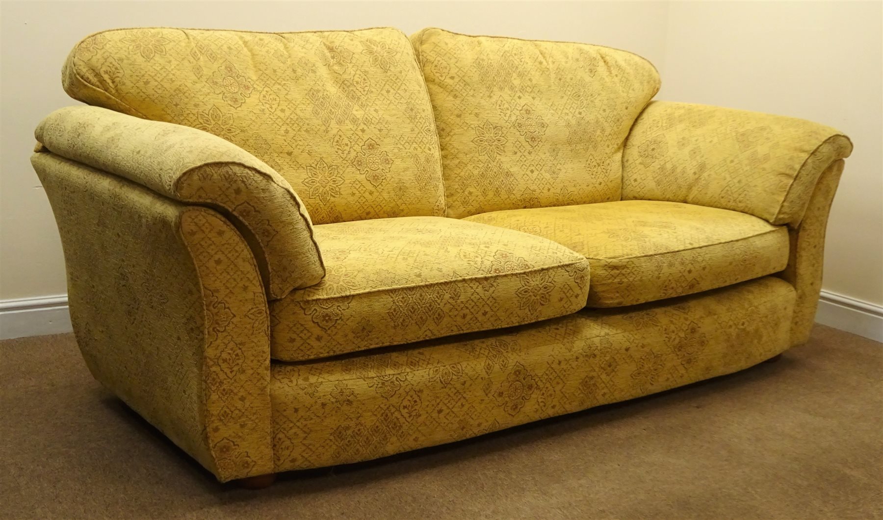 Marks and Spencer's three seat sofa upholstered in a floral patterned